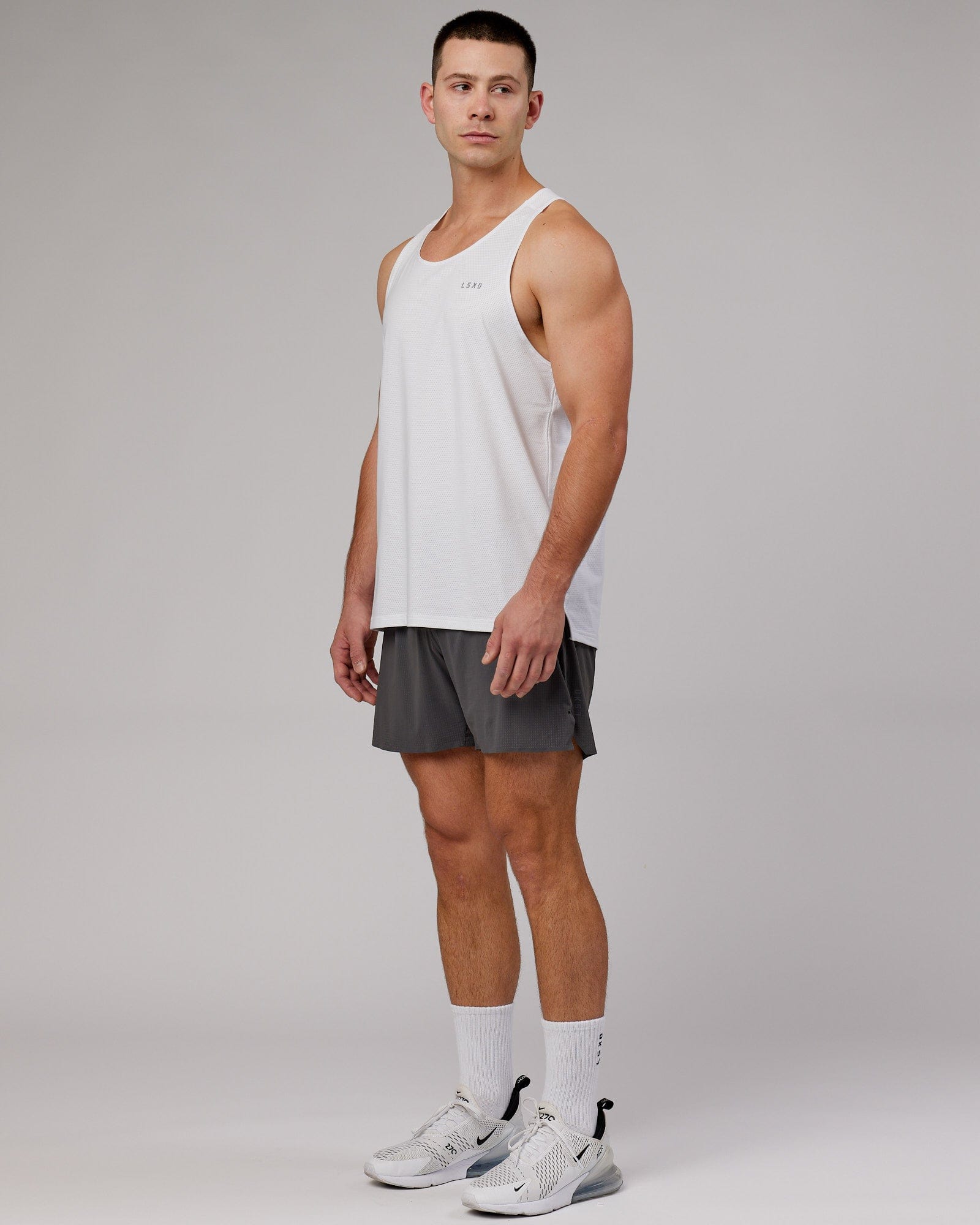Model wearing UltraAir 6" Lined Performance Short - Asphalt
