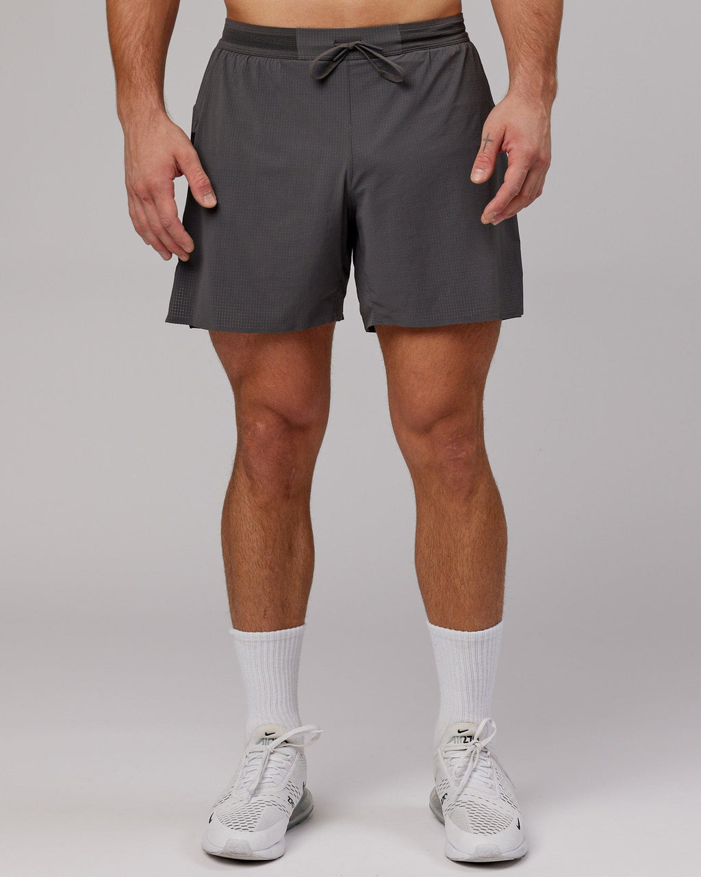 Model wearing UltraAir 6" Lined Performance Short - Asphalt