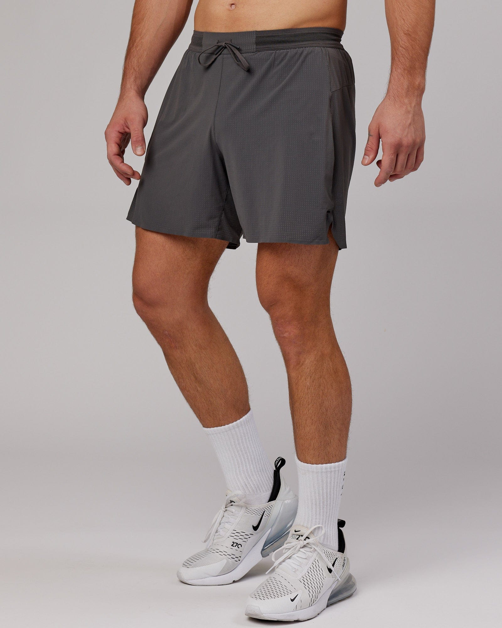Model wearing UltraAir 6" Lined Performance Short - Asphalt