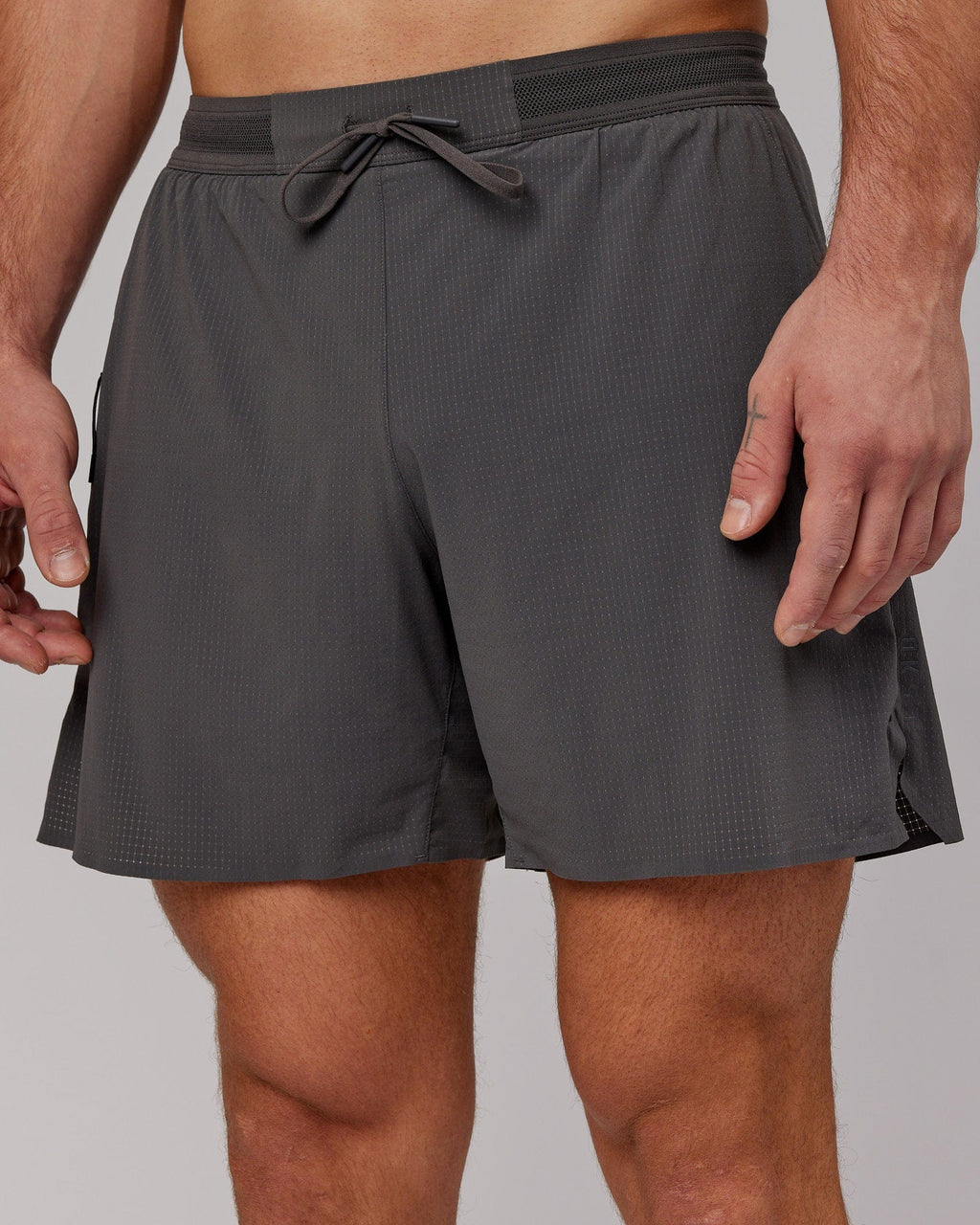 Model wearing UltraAir 6" Lined Performance Short - Asphalt