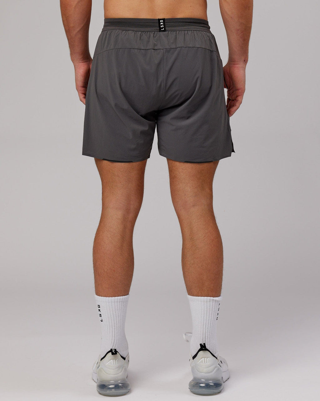 Model wearing UltraAir 6" Lined Performance Short - Asphalt