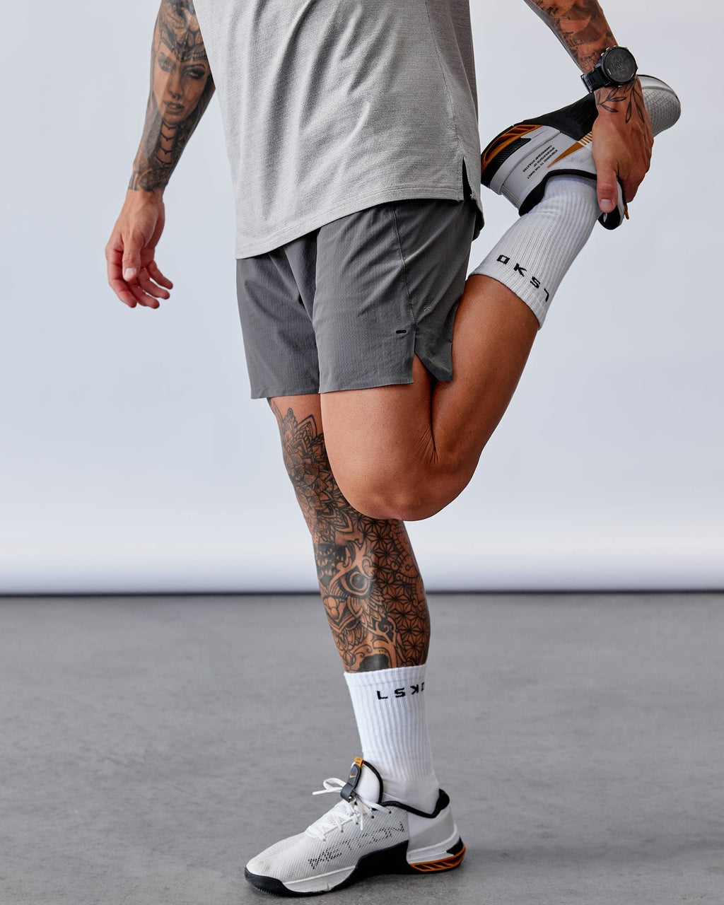 Model wearing UltraAir 6" Lined Performance Short - Asphalt