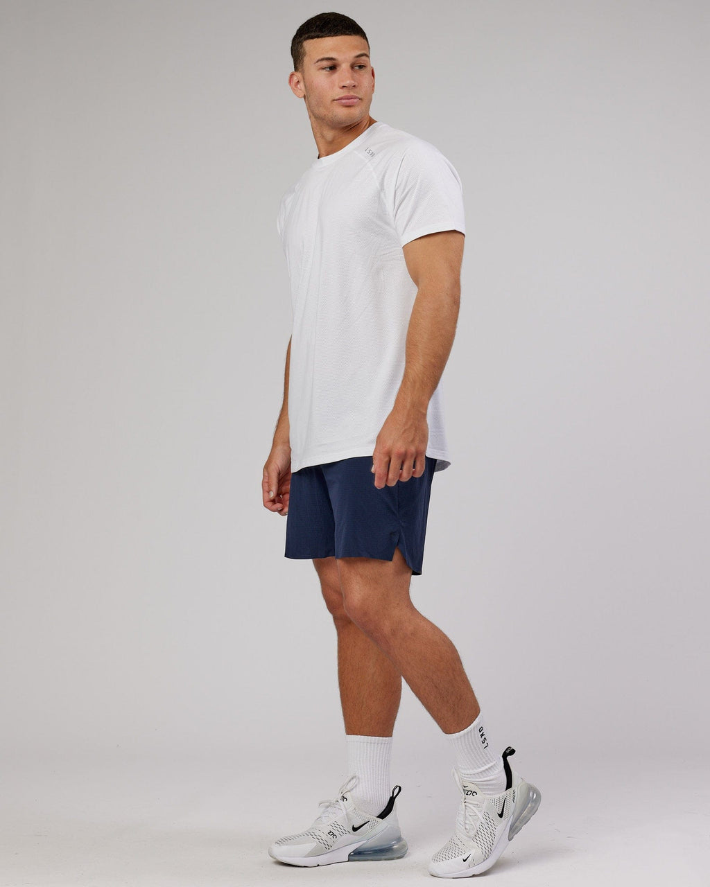 Model wearing UltraAir 6" Lined Performance Short - Navy