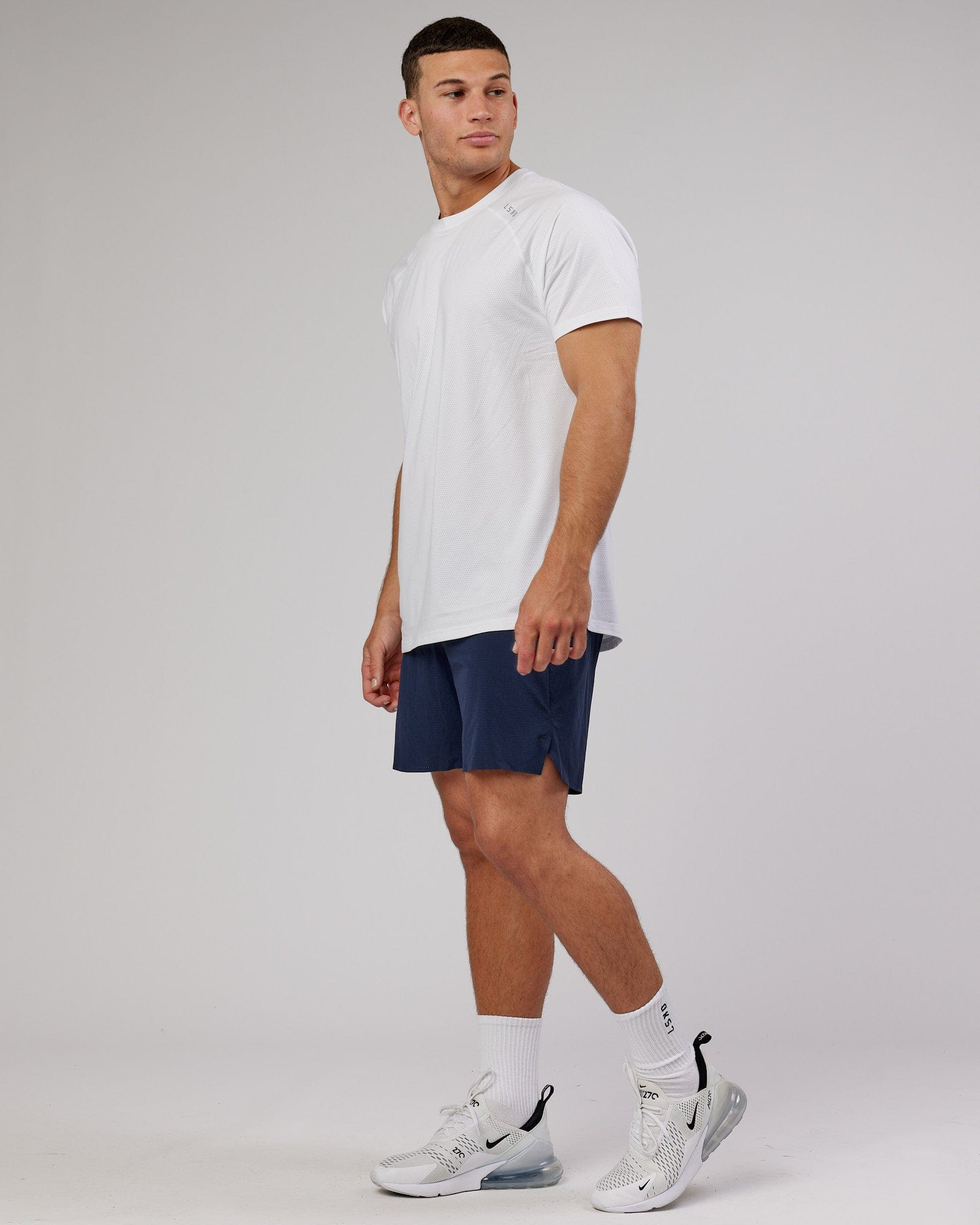 Model wearing UltraAir 6" Lined Performance Short - Navy