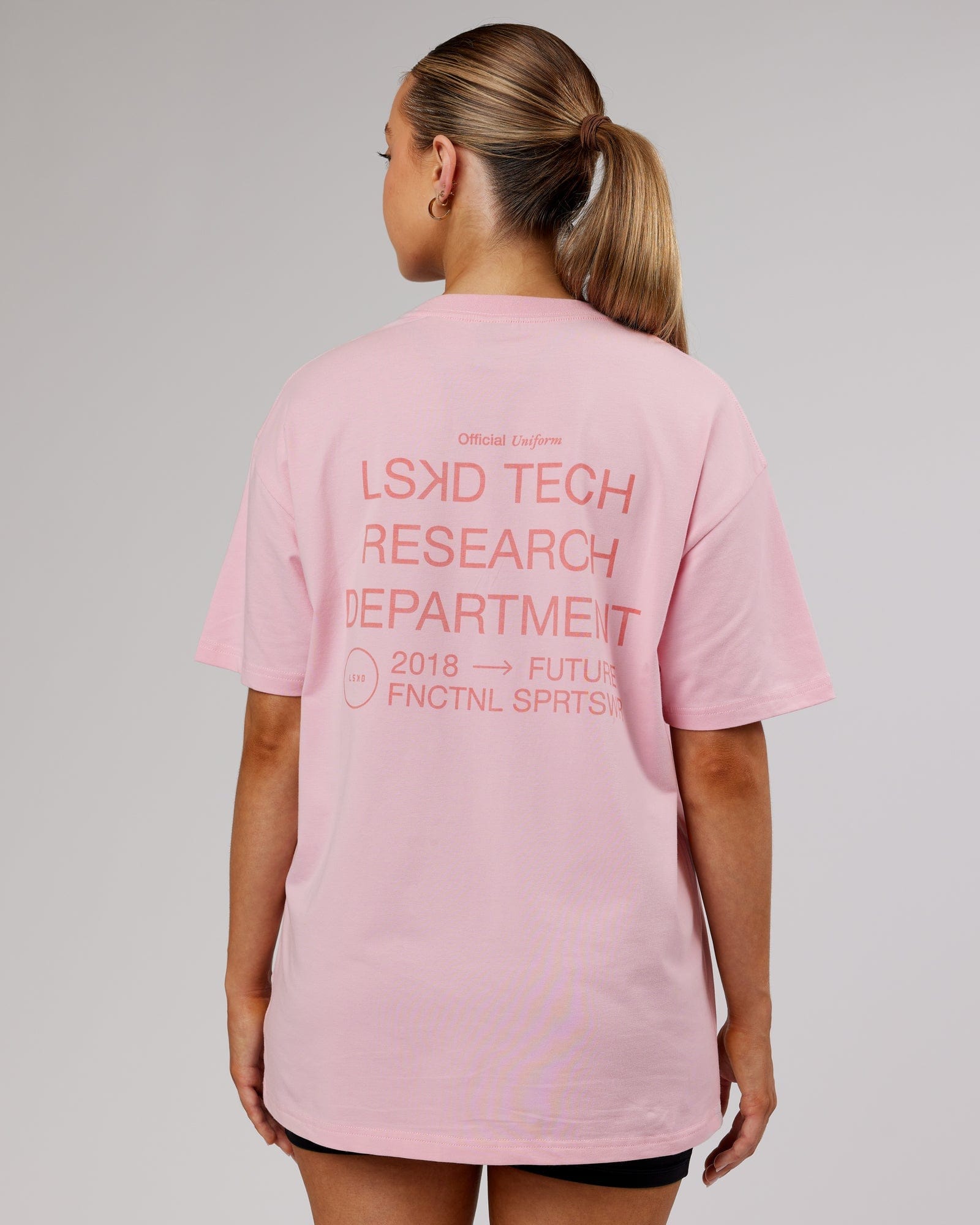 Model wearing Unisex LTRD FLXCotton Tee Oversize - Bleached Mauve