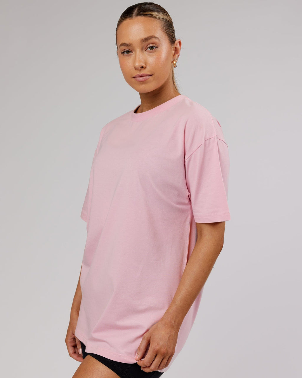 Model wearing Unisex LTRD FLXCotton Tee Oversize - Bleached Mauve