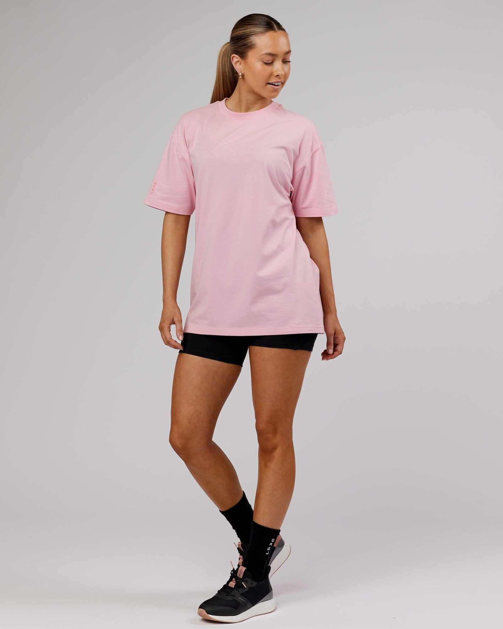 Model wearing Unisex LTRD FLXCotton Tee Oversize - Bleached Mauve