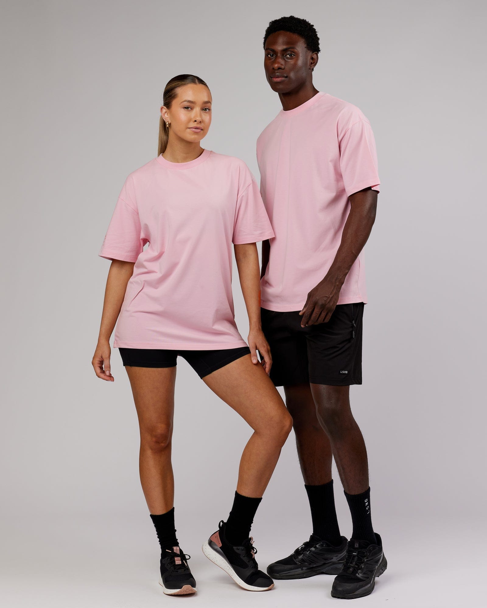 Model wearing Unisex LTRD FLXCotton Tee Oversize - Bleached Mauve