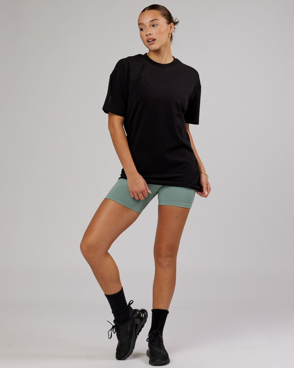 Model wearing Unisex LTRD FLXCotton Tee Oversize - Black-Black