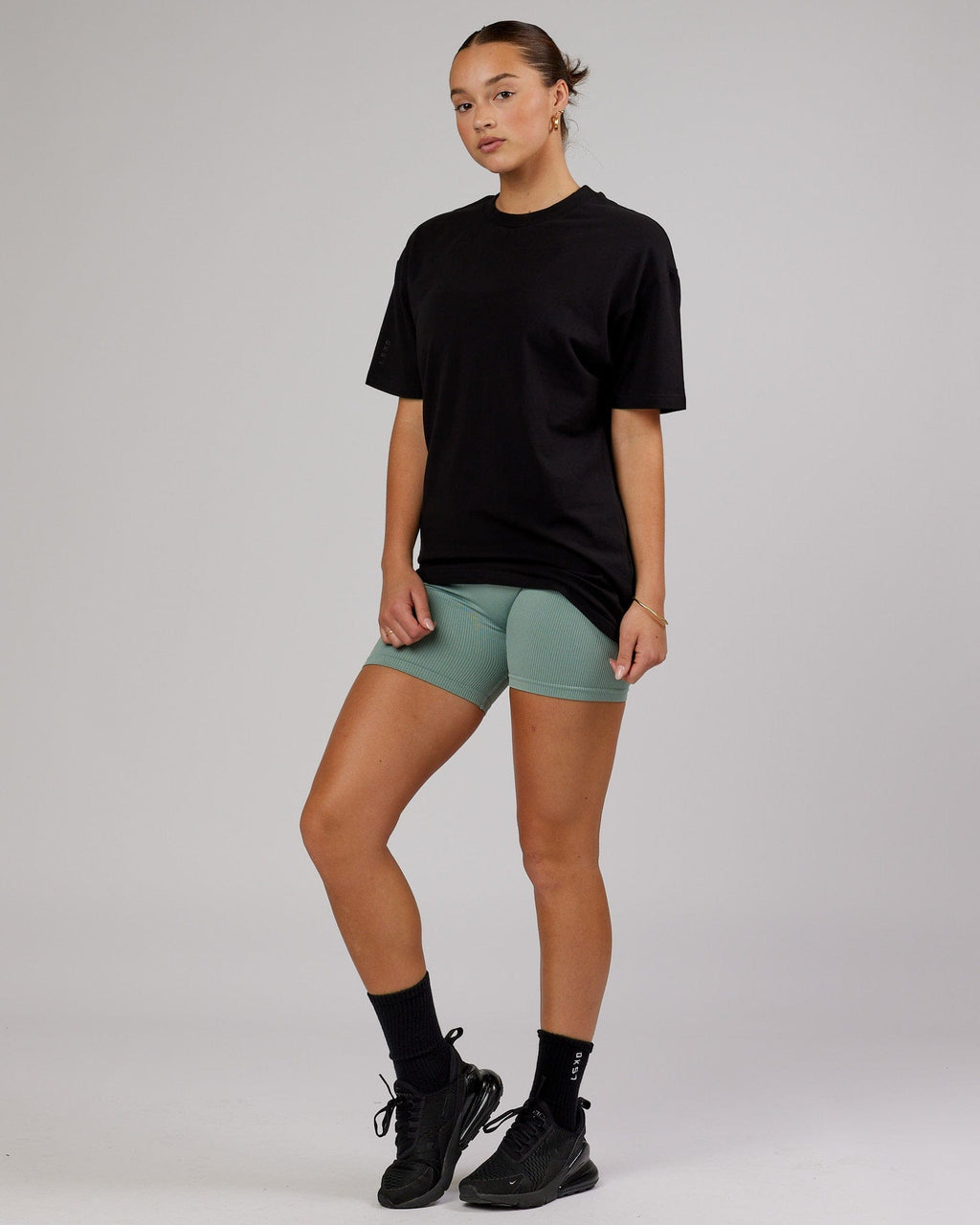 Model wearing Unisex LTRD FLXCotton Tee Oversize - Black-Black