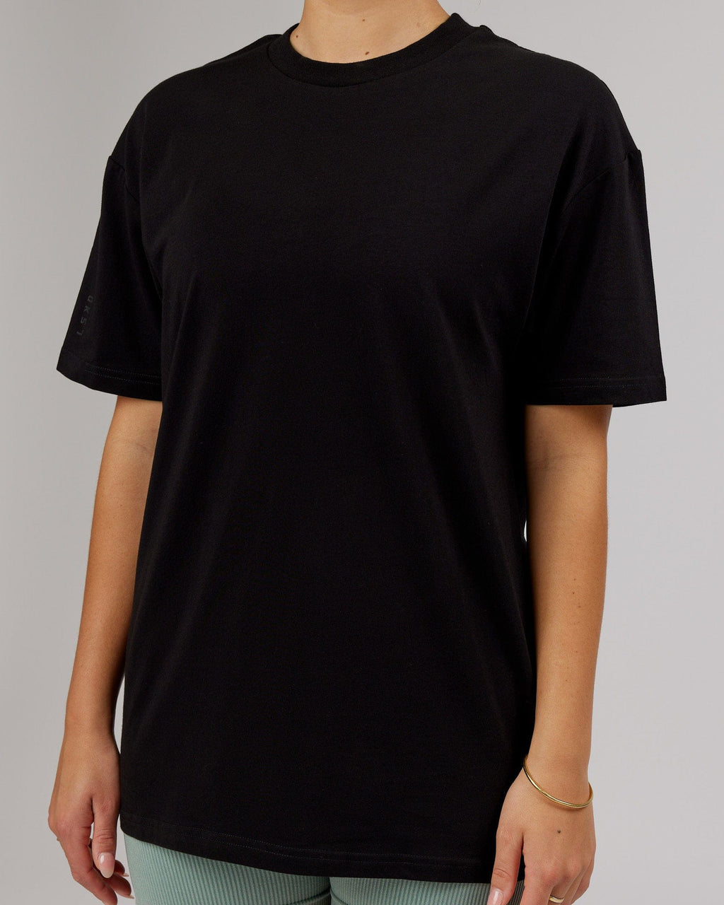 Model wearing Unisex LTRD FLXCotton Tee Oversize - Black-Black