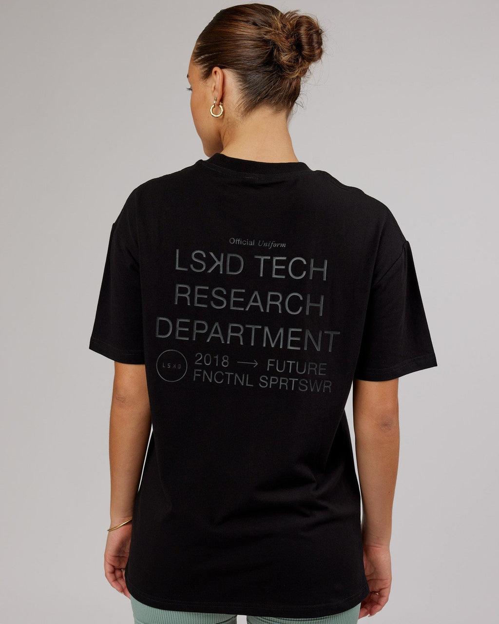 Model wearing Unisex LTRD FLXCotton Tee Oversize - Black-Black