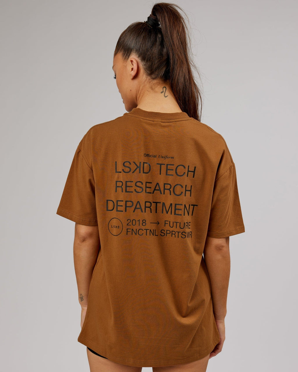 Model wearing Unisex LTRD FLXCotton Tee Oversize - Camel
