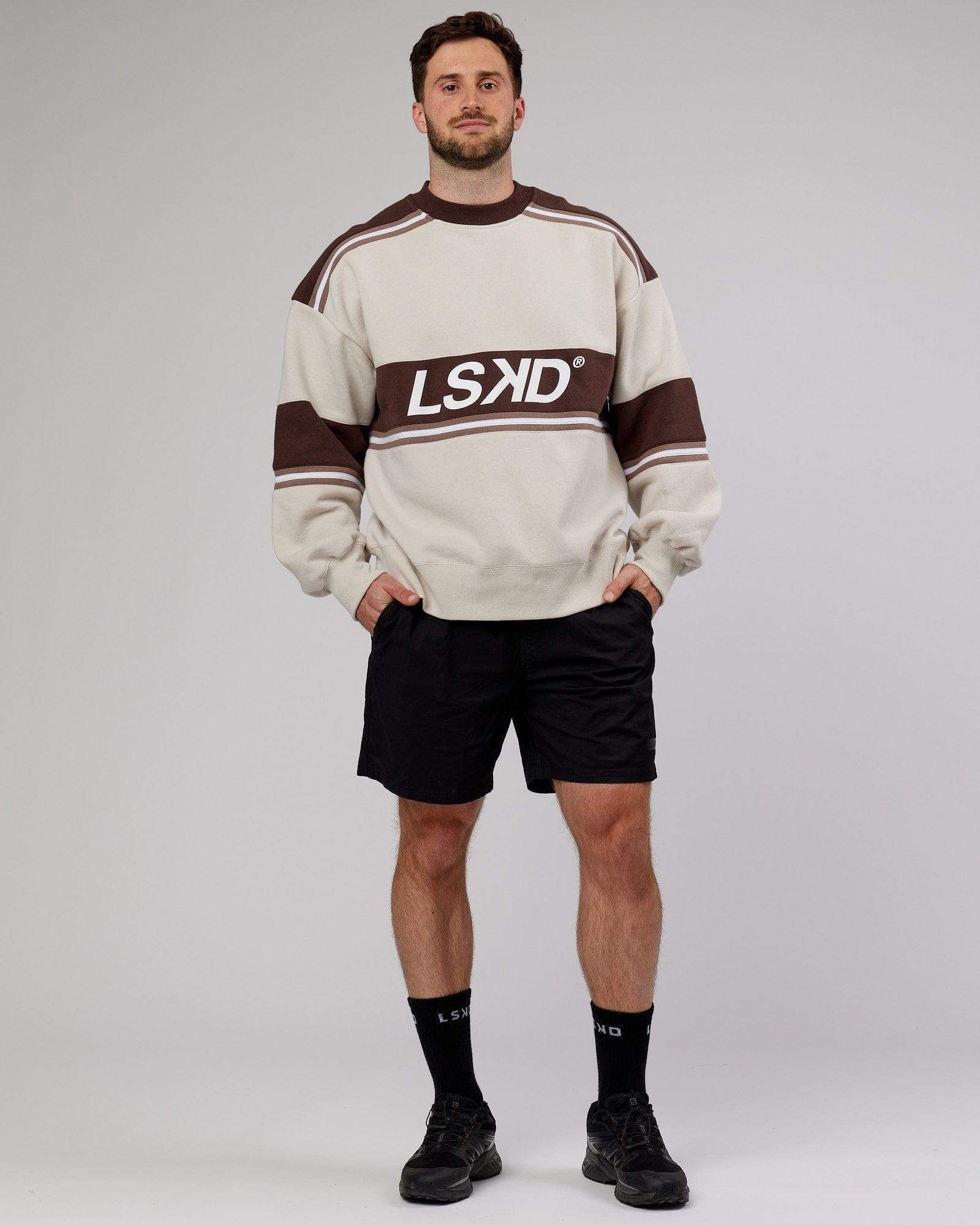 Model wearing Unisex A-Team Sweater Oversize - White-Deep Taupe