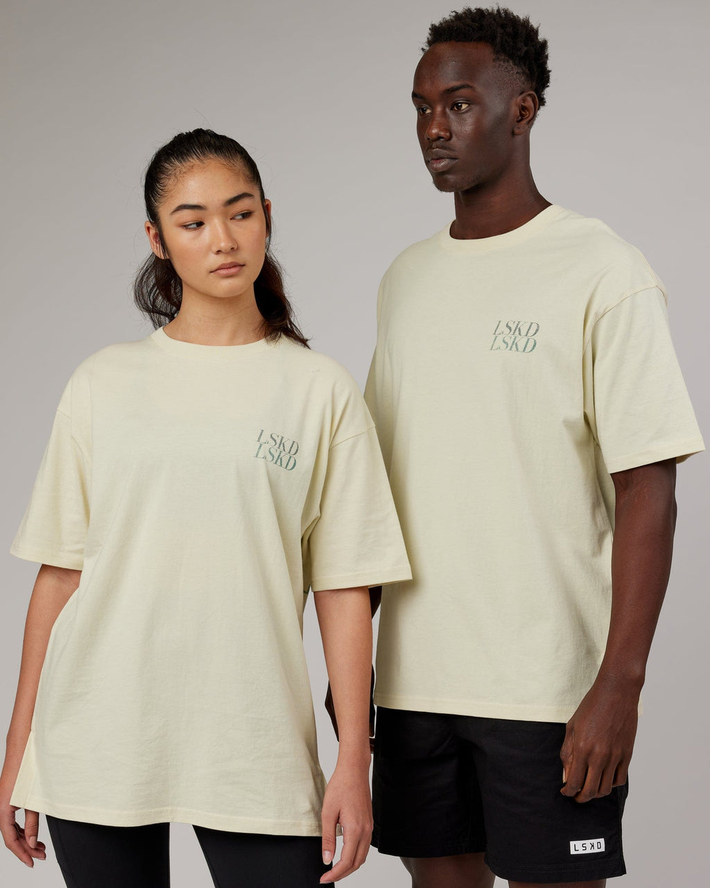 Model wearing Aurora Oversize Tee - Almond Milk