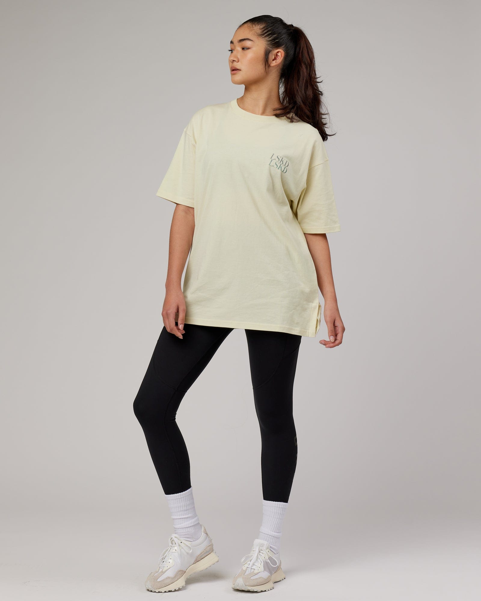 Model wearing Aurora Oversize Tee - Almond Milk