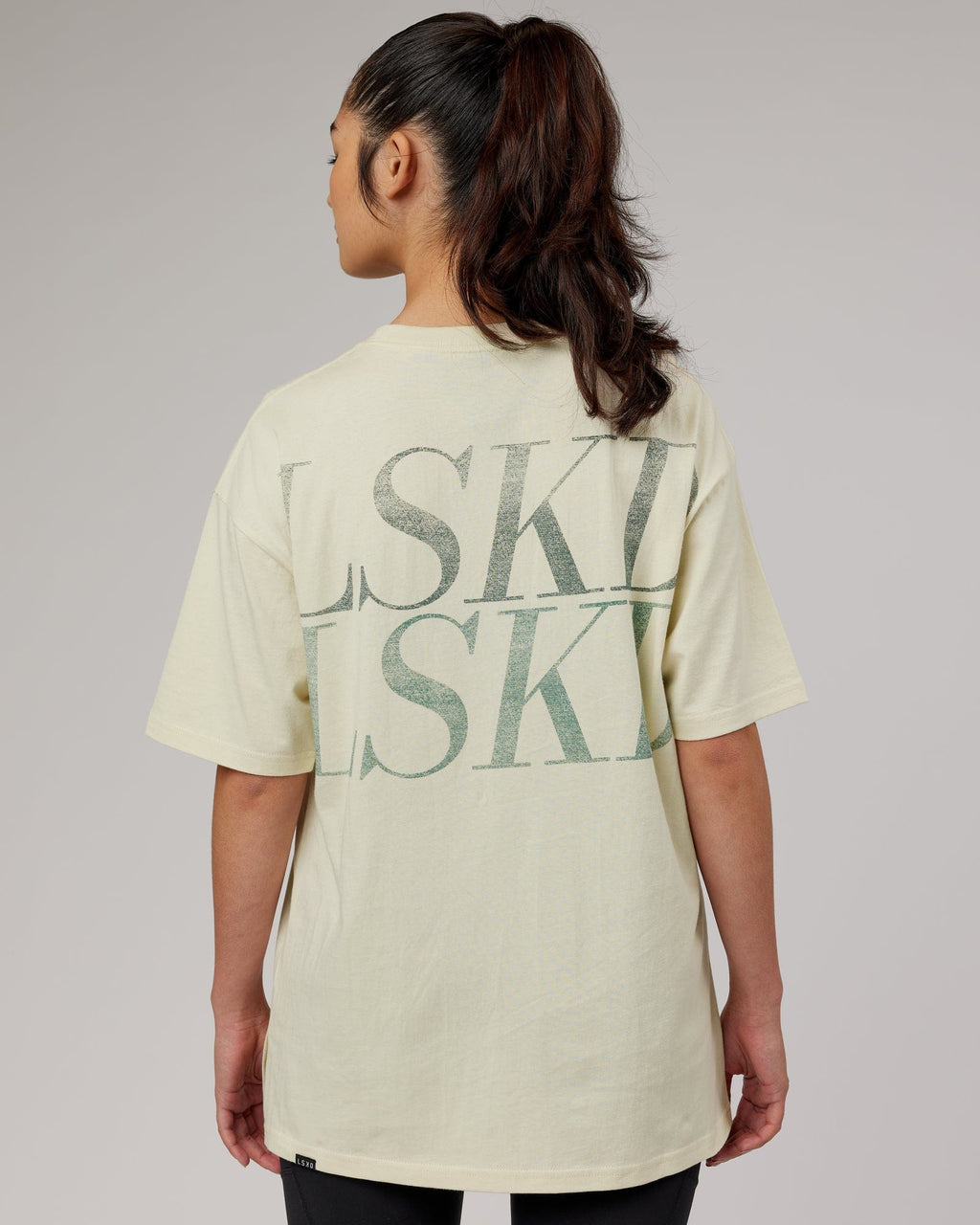 Model wearing Aurora Oversize Tee - Almond Milk