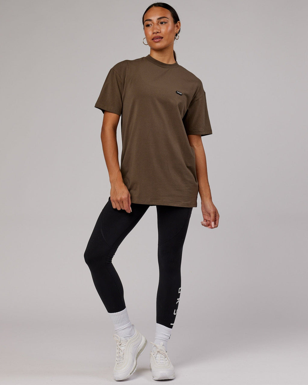 Model wearing Unisex Capsule FLXCotton Tee Oversize - Army Green