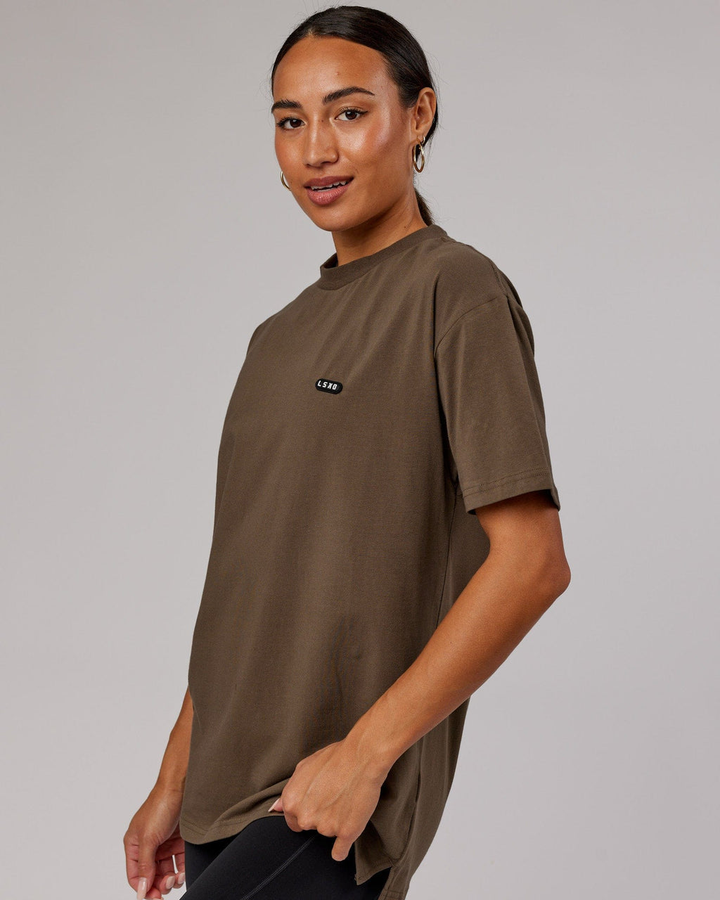 Model wearing Unisex Capsule FLXCotton Tee Oversize - Army Green
