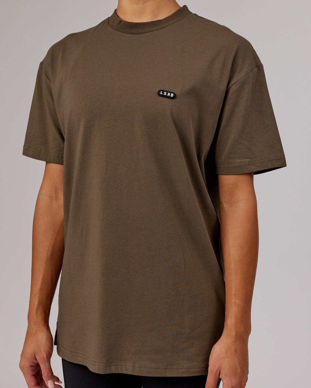 Model wearing Unisex Capsule FLXCotton Tee Oversize - Army Green