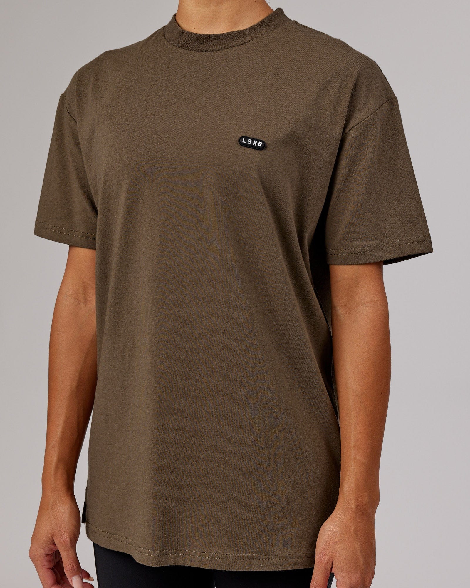 Model wearing Unisex Capsule FLXCotton Tee Oversize - Army Green