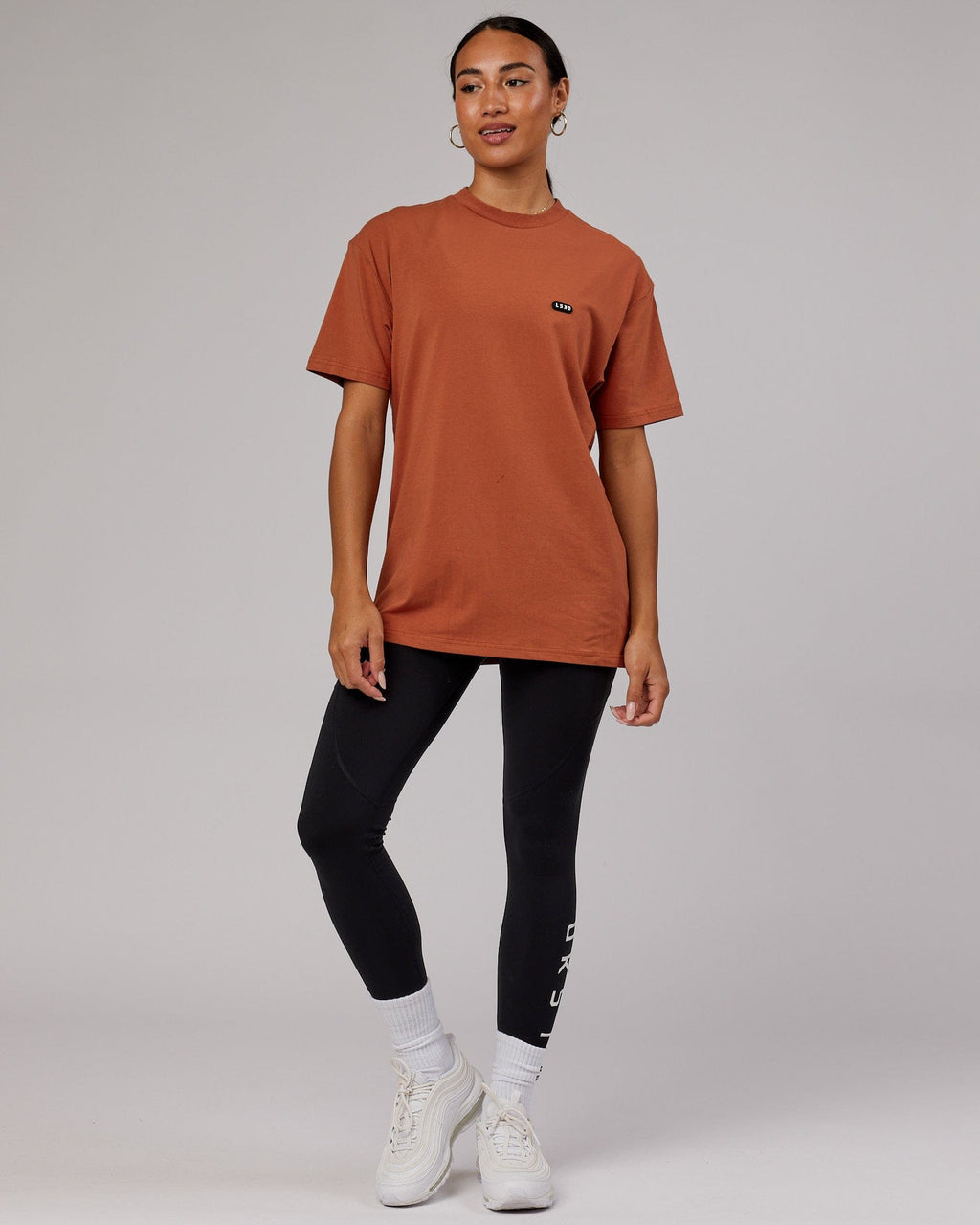 Model wearing Unisex Capsule FLXCotton Tee Oversize - Auburn