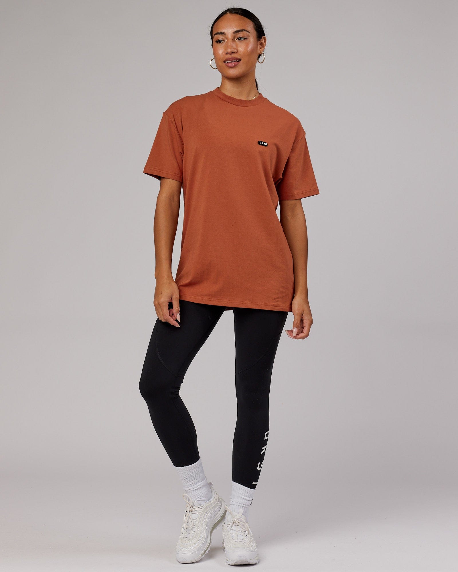 Model wearing Unisex Capsule FLXCotton Tee Oversize - Auburn