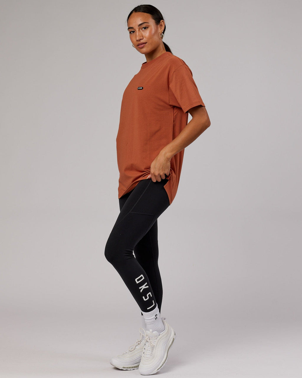 Model wearing Unisex Capsule FLXCotton Tee Oversize - Auburn