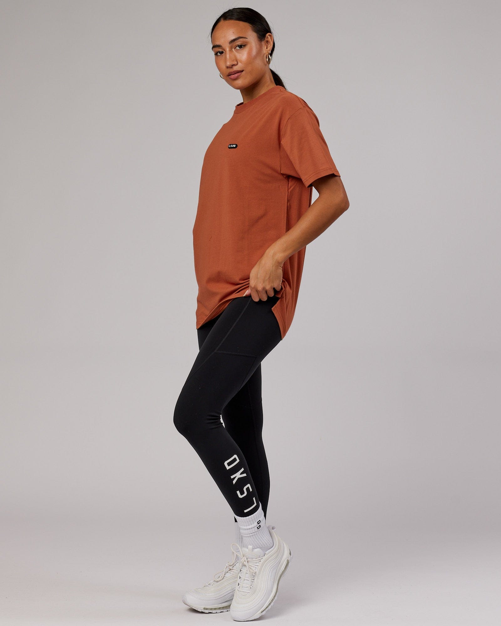 Model wearing Unisex Capsule FLXCotton Tee Oversize - Auburn