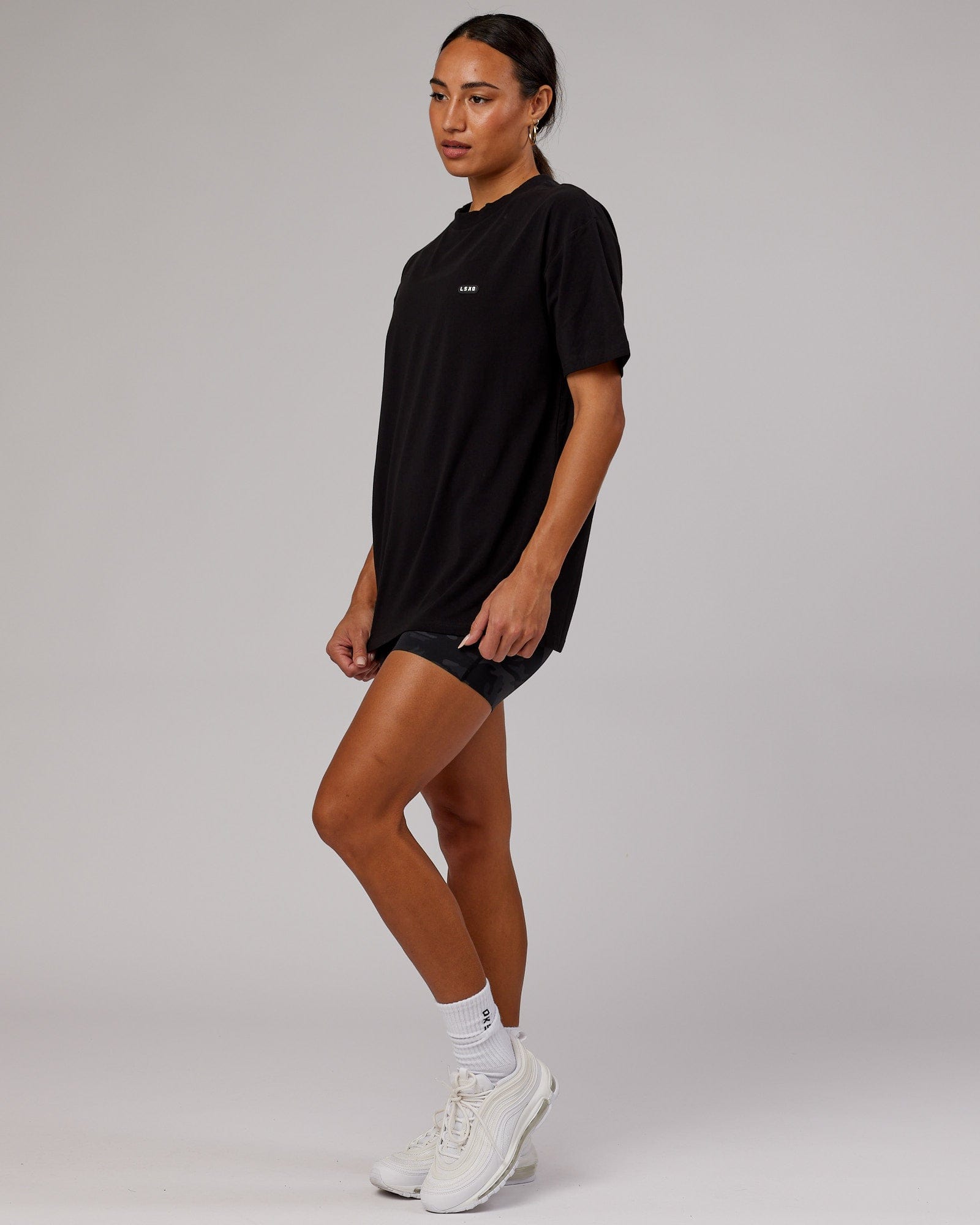 Model wearing Unisex Capsule FLXCotton Tee Oversize - Black