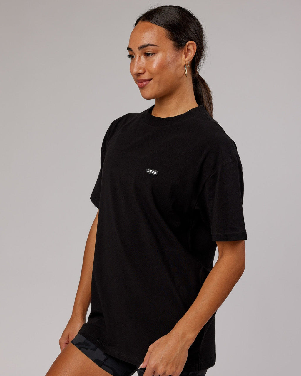 Model wearing Unisex Capsule FLXCotton Tee Oversize - Black