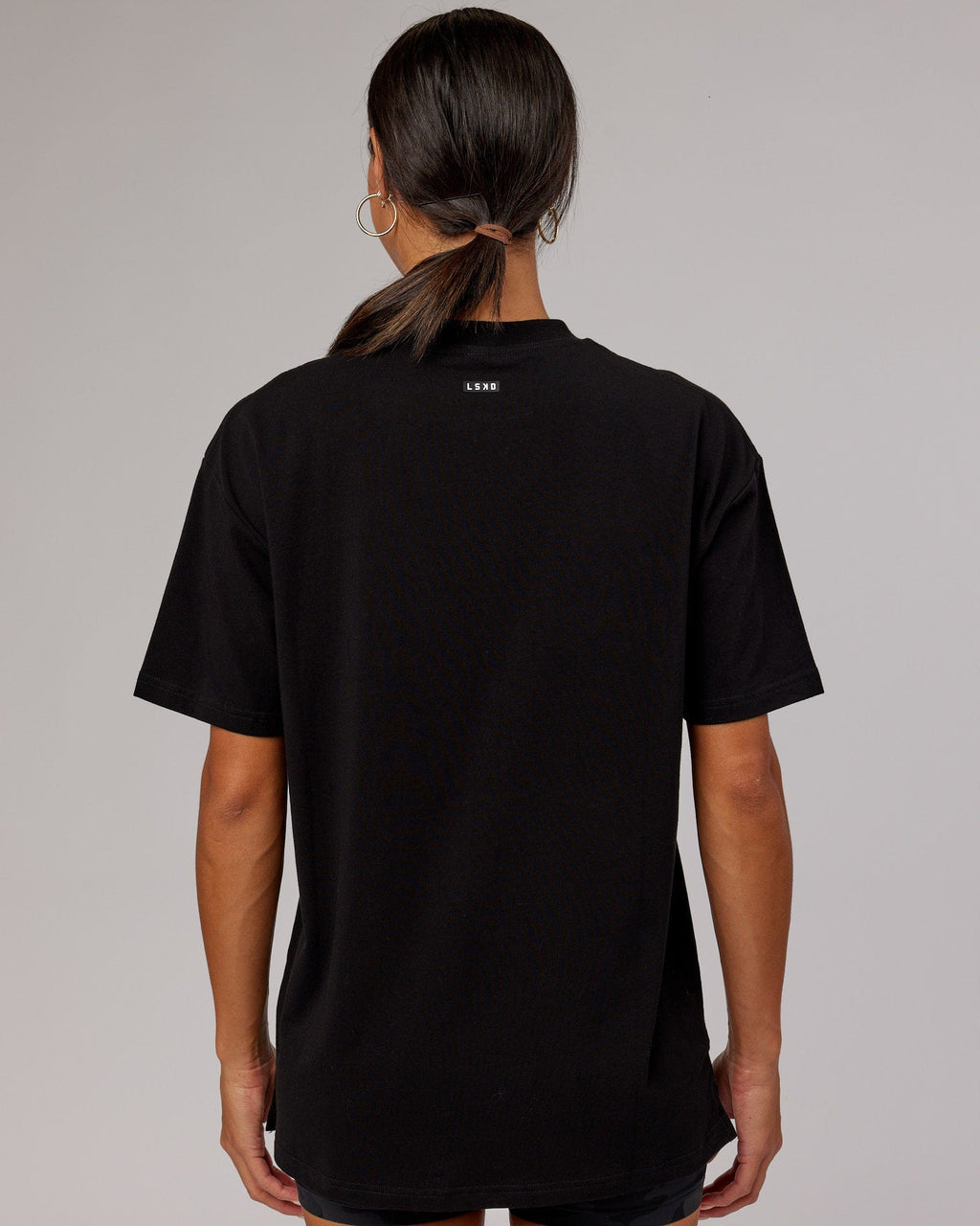Model wearing Unisex Capsule FLXCotton Tee Oversize - Black
