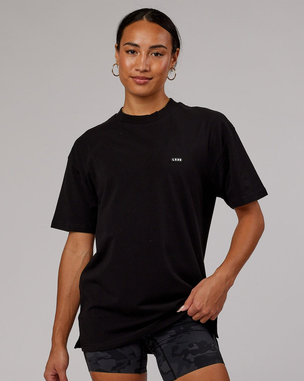 Model wearing Unisex Capsule FLXCotton Tee Oversize - Black