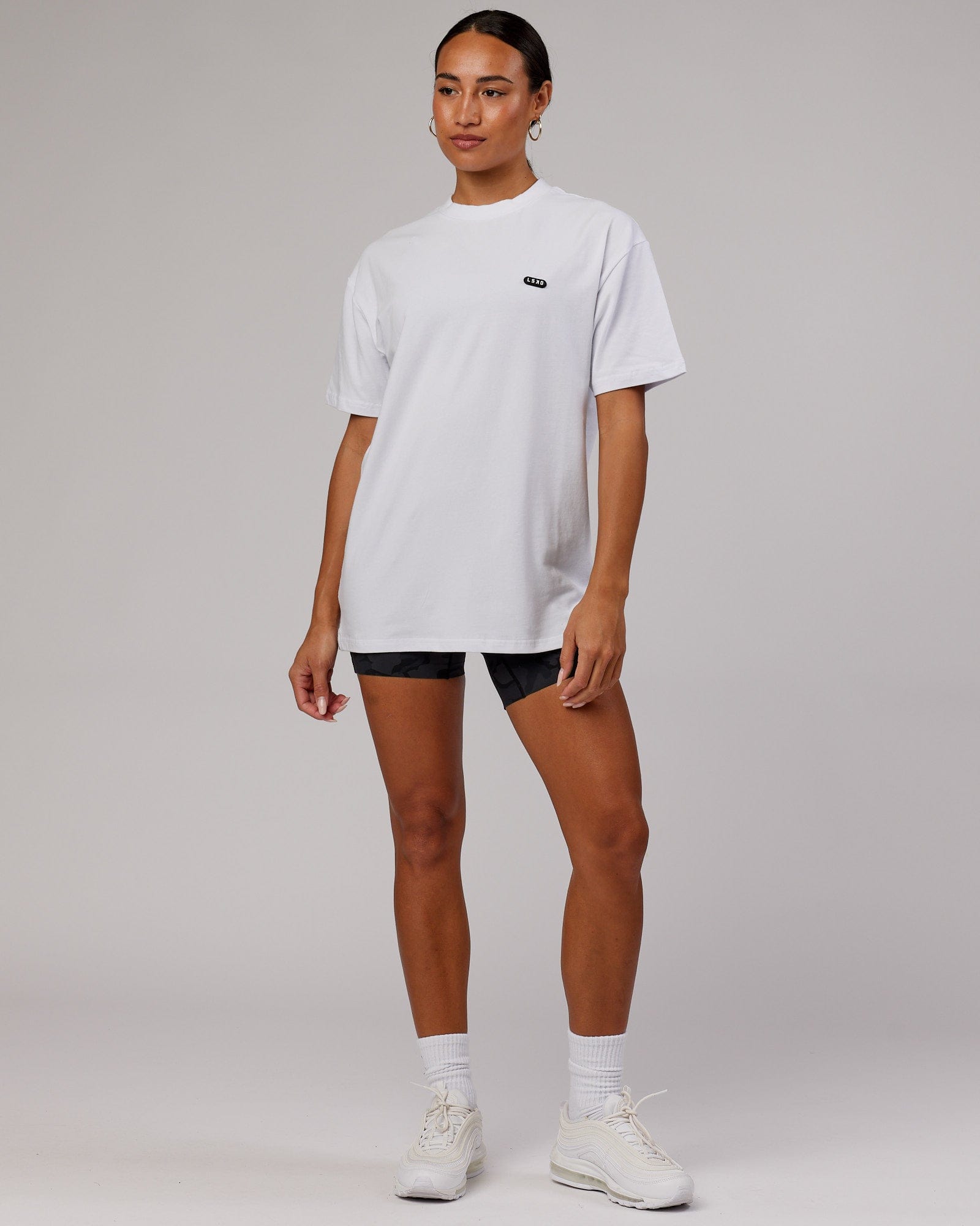 Model wearing Unisex Capsule FLXCotton Tee Oversize - White
