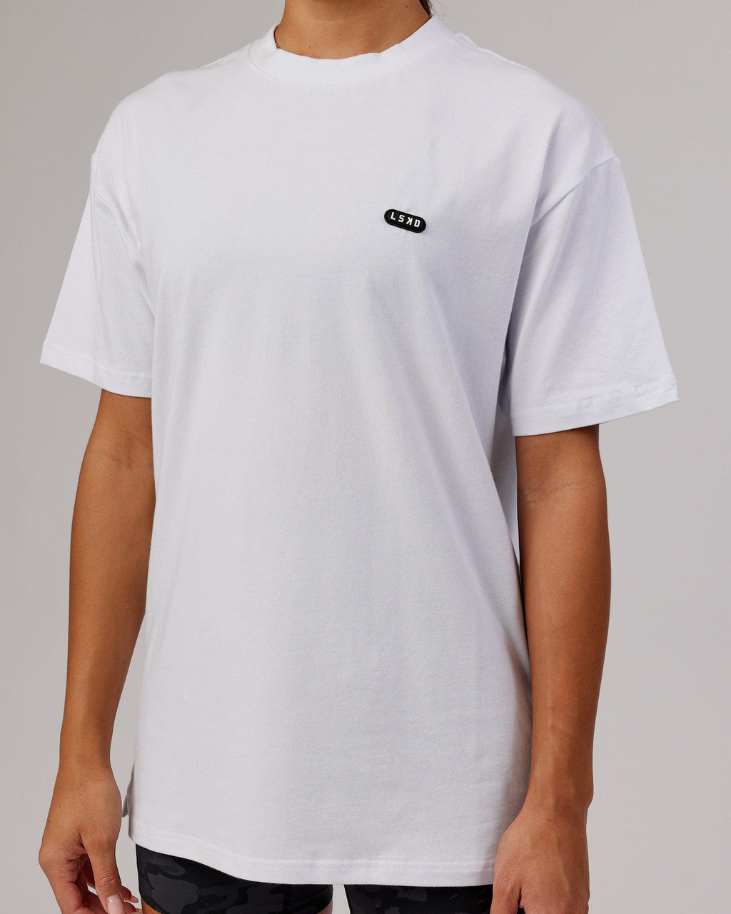 Model wearing Unisex Capsule FLXCotton Tee Oversize - White