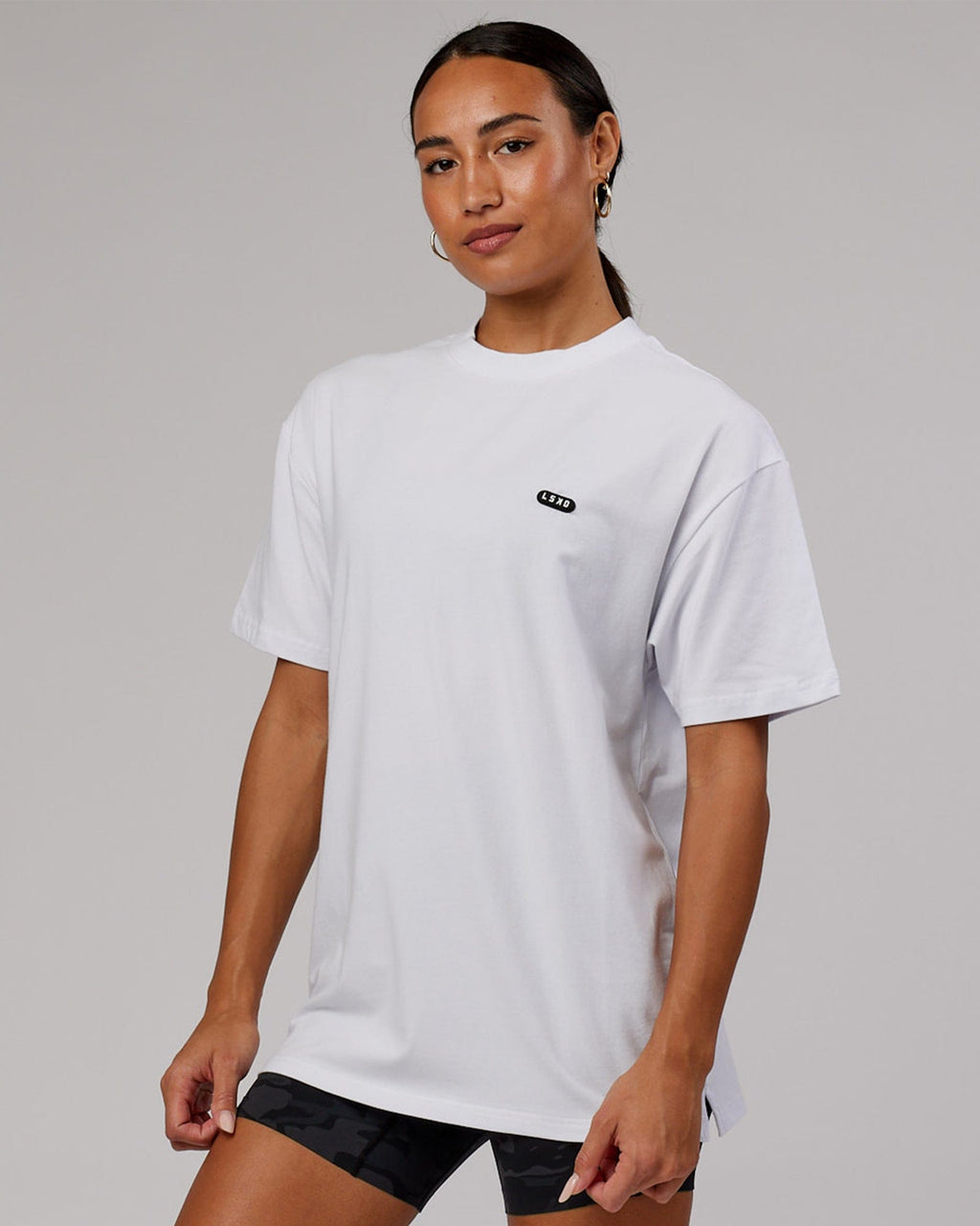 Model wearing Unisex Capsule FLXCotton Tee Oversize - White