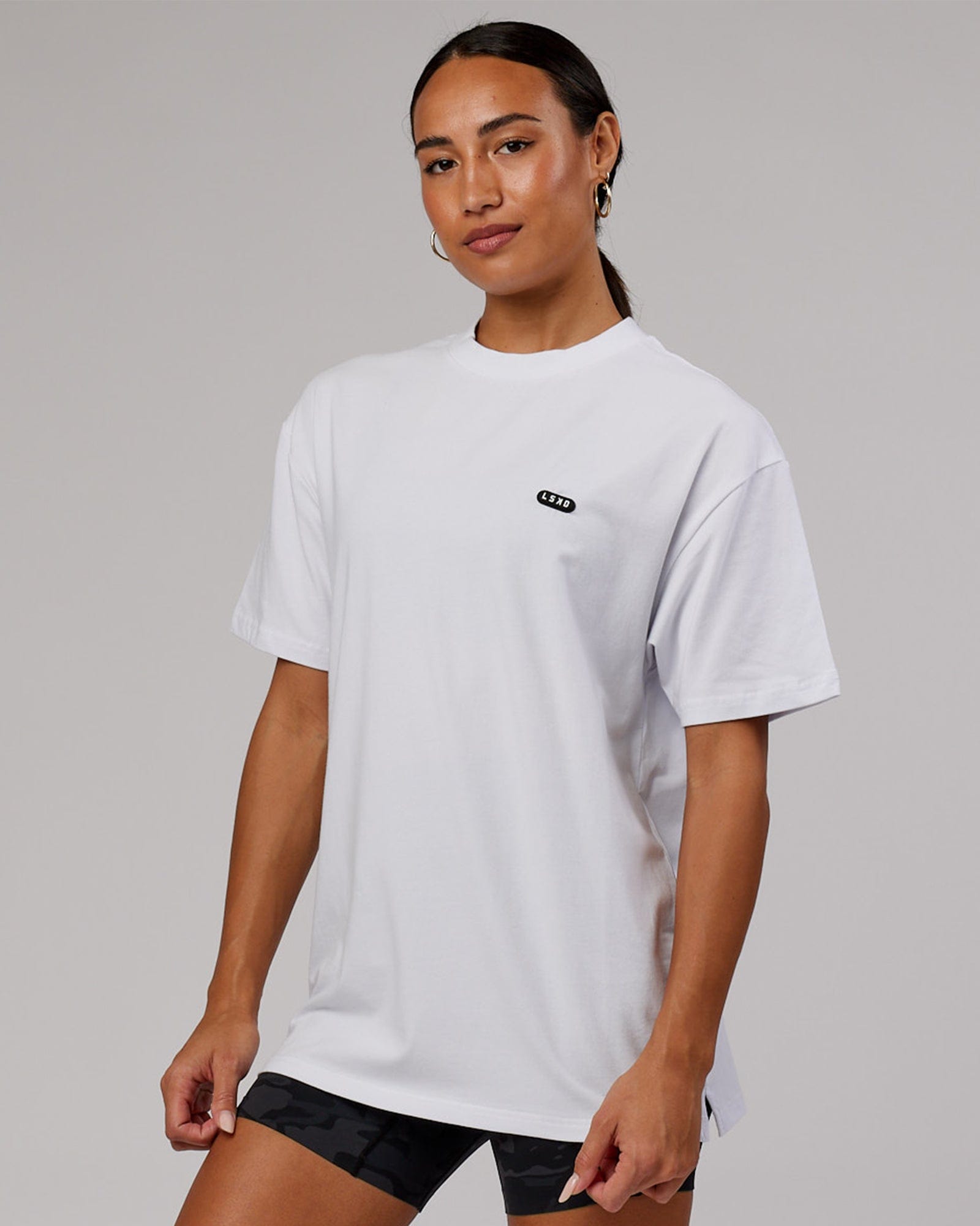 Model wearing Unisex Capsule FLXCotton Tee Oversize - White