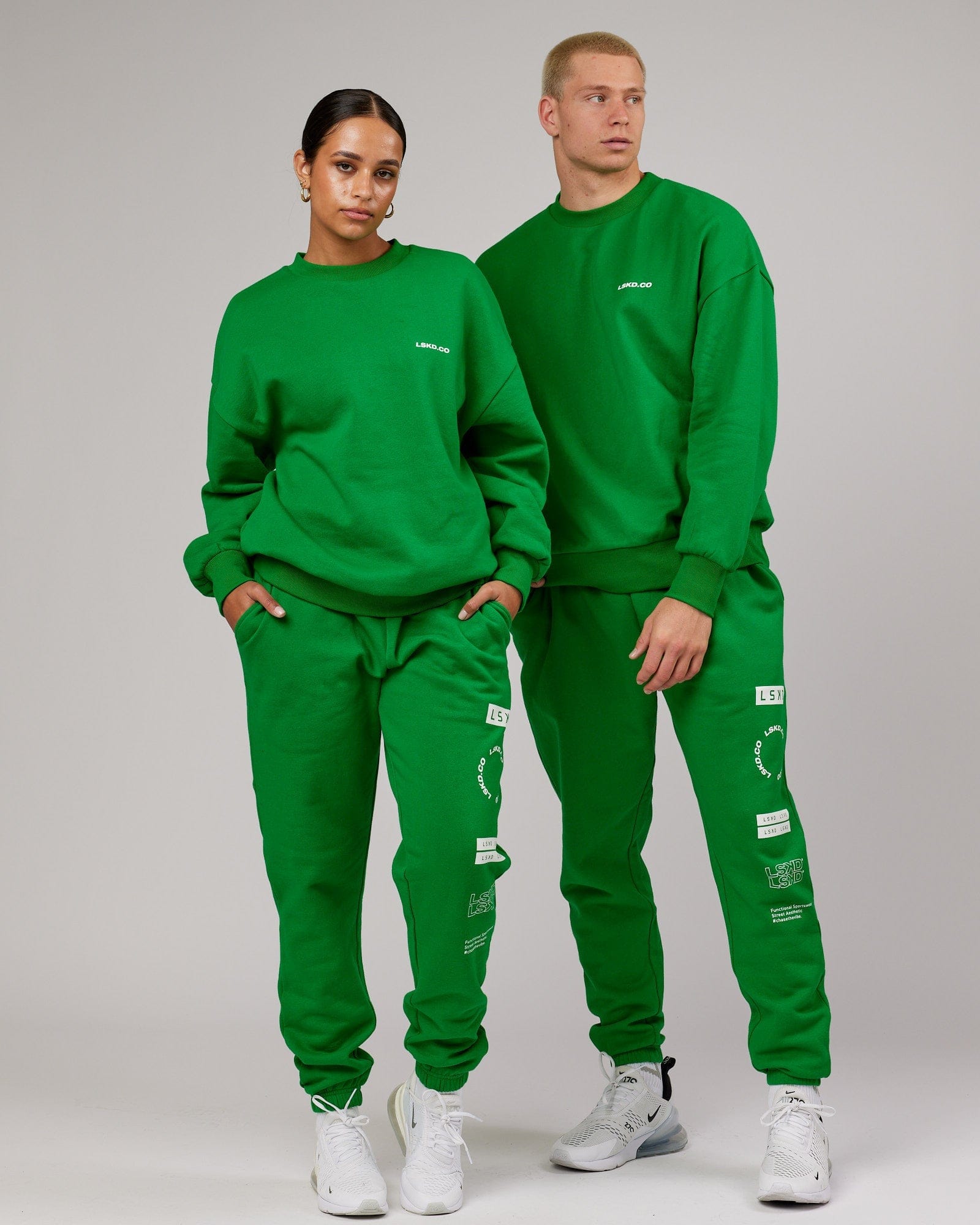 Model wearing Unisex Combo Track Pant - Vivid Green