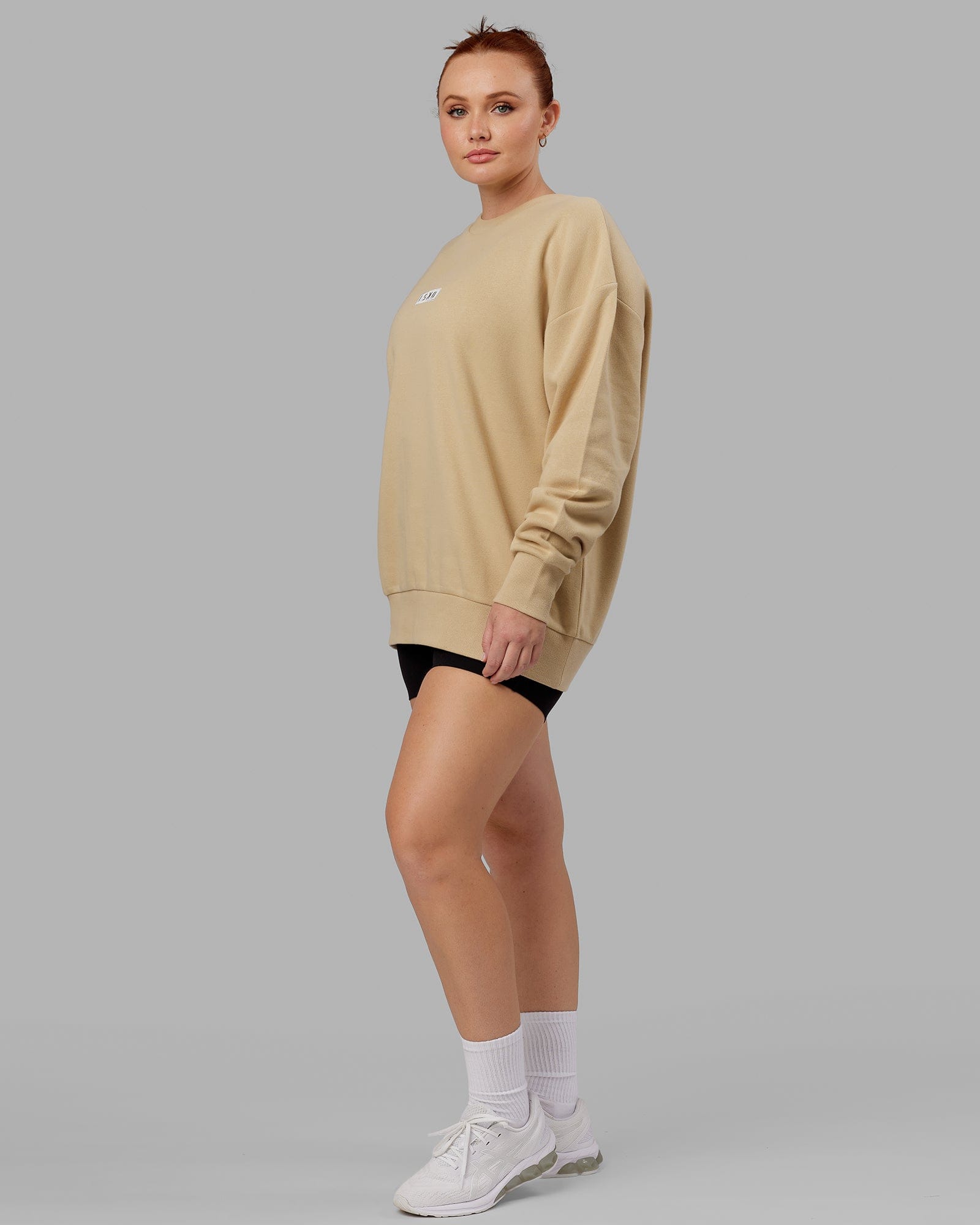 Model wearing Unisex Cornerstone Sweater Oversize - Pale Khaki