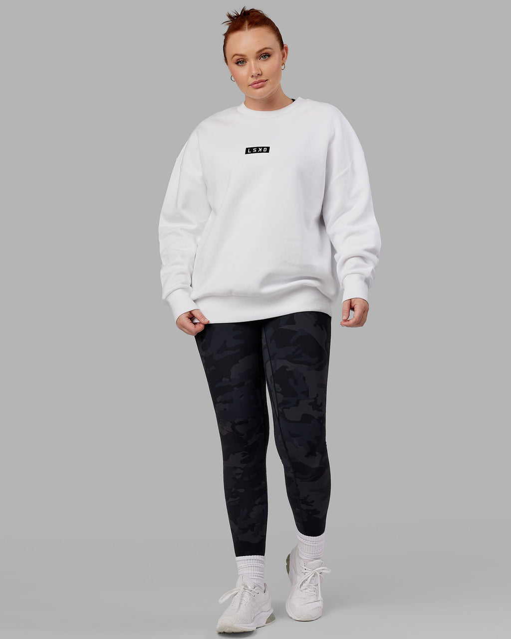 Model wearing Unisex Cornerstone Sweater Oversize - White