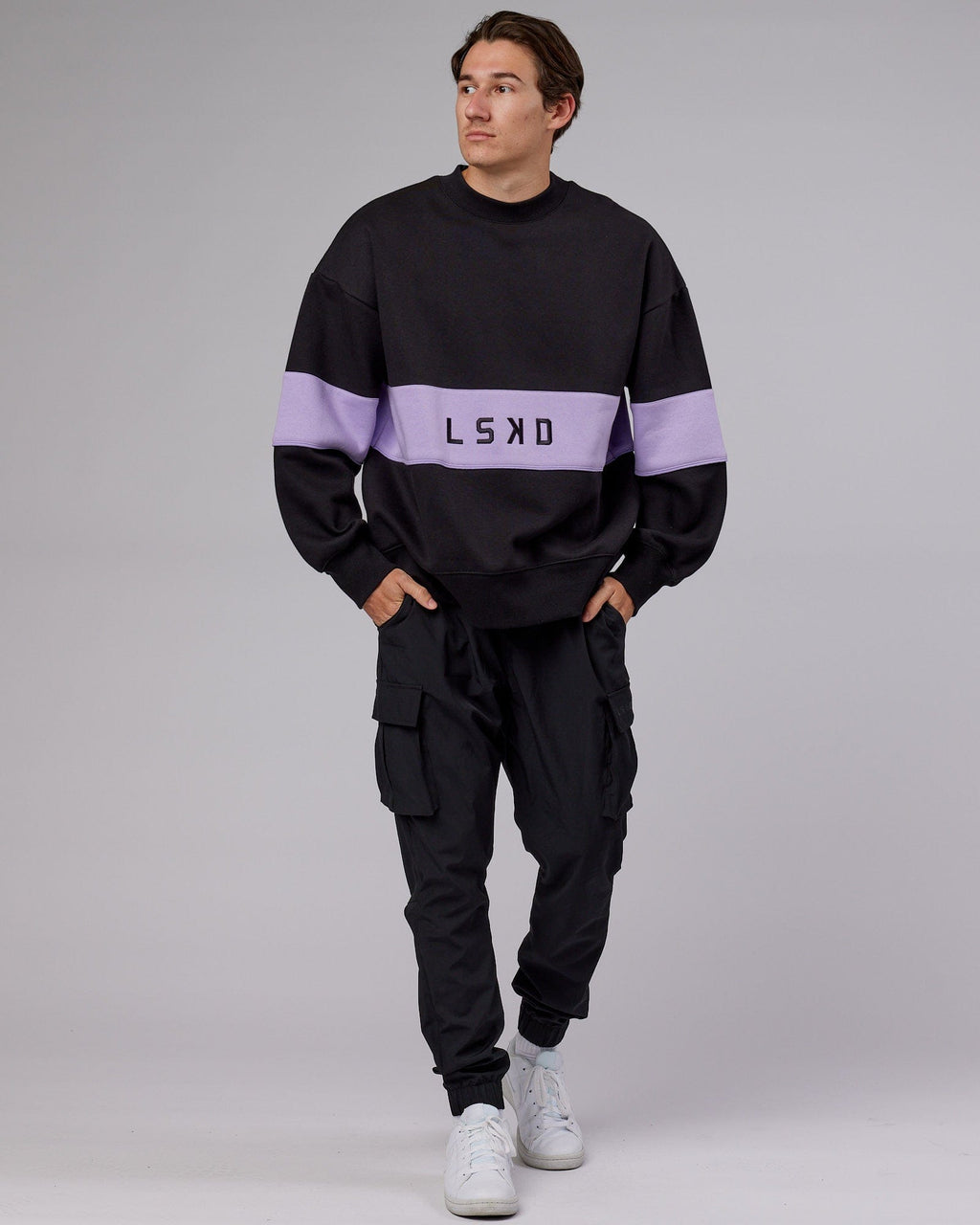 Model wearing Unisex Extra Time Sweater Oversize - Black-Pale Lilac