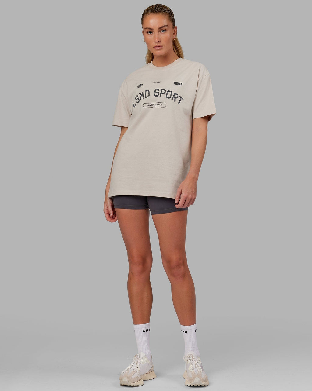 Model wearing Unisex Free Throw Heavyweight Tee Oversize - Shale Biege