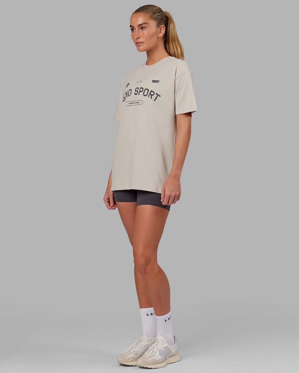 Model wearing Unisex Free Throw Heavyweight Tee Oversize - Shale Biege