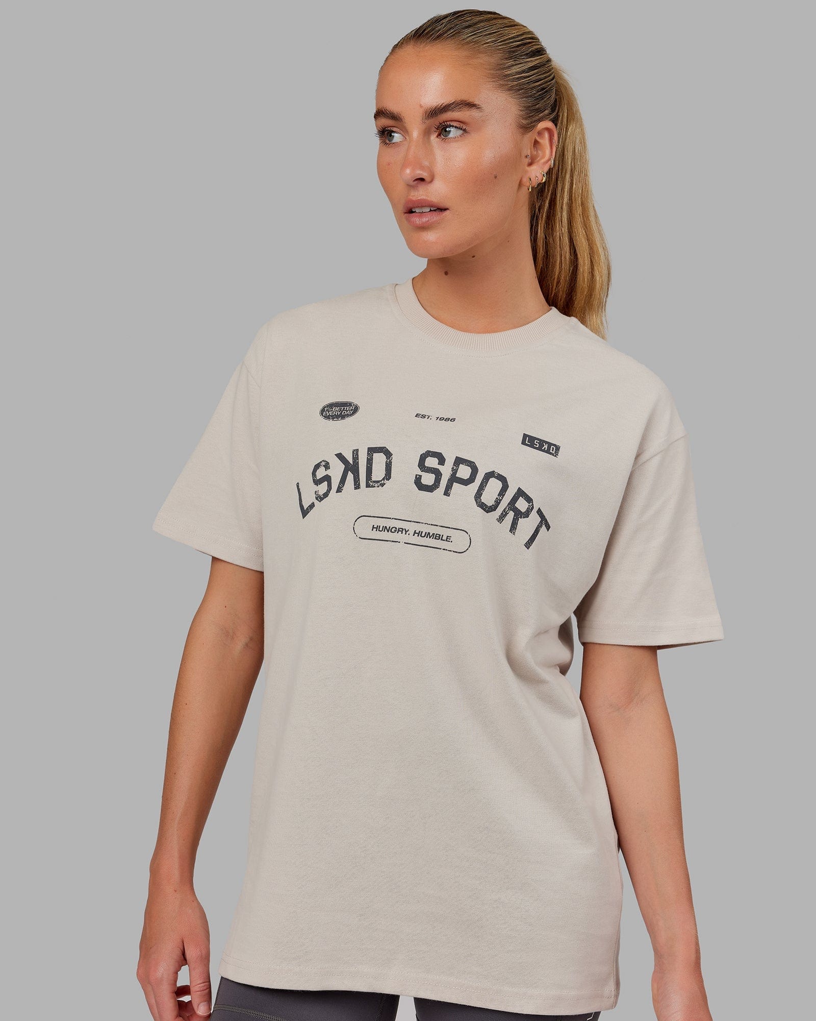 Model wearing Unisex Free Throw Heavyweight Tee Oversize - Shale Biege