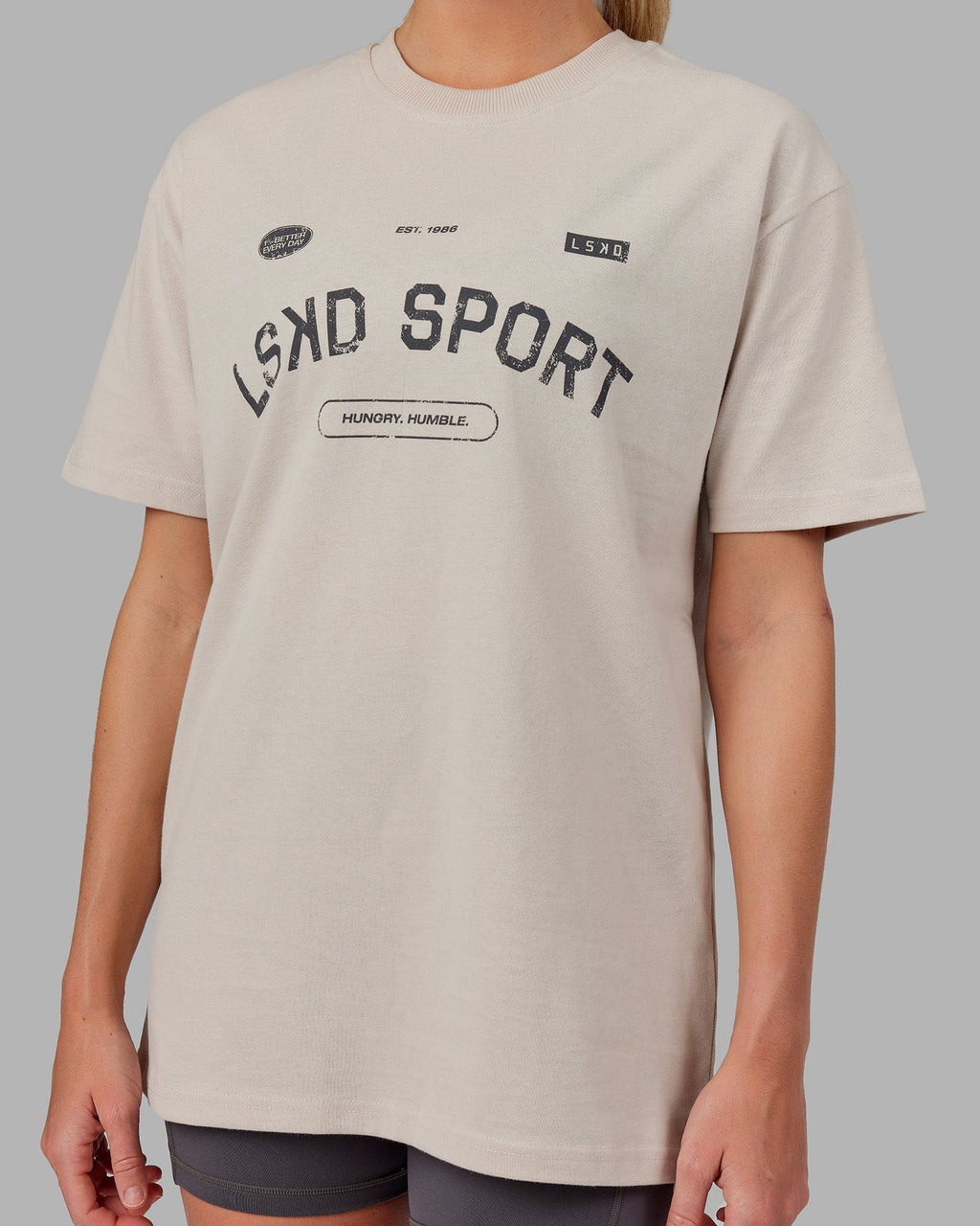 Model wearing Unisex Free Throw Heavyweight Tee Oversize - Shale Biege