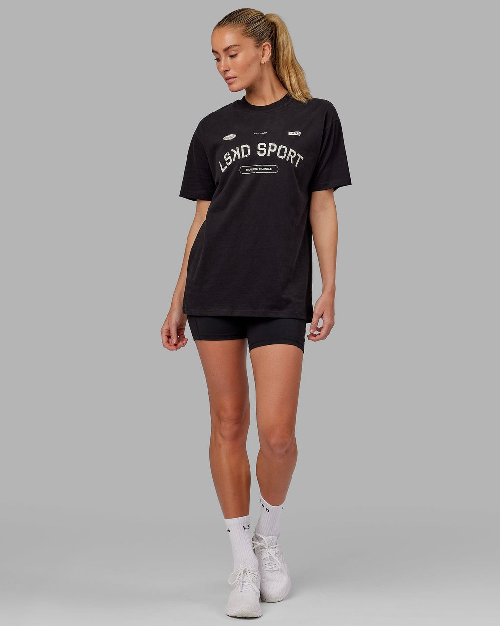 Model wearing Unisex Free Throw Heavyweight Tee Oversize - Black