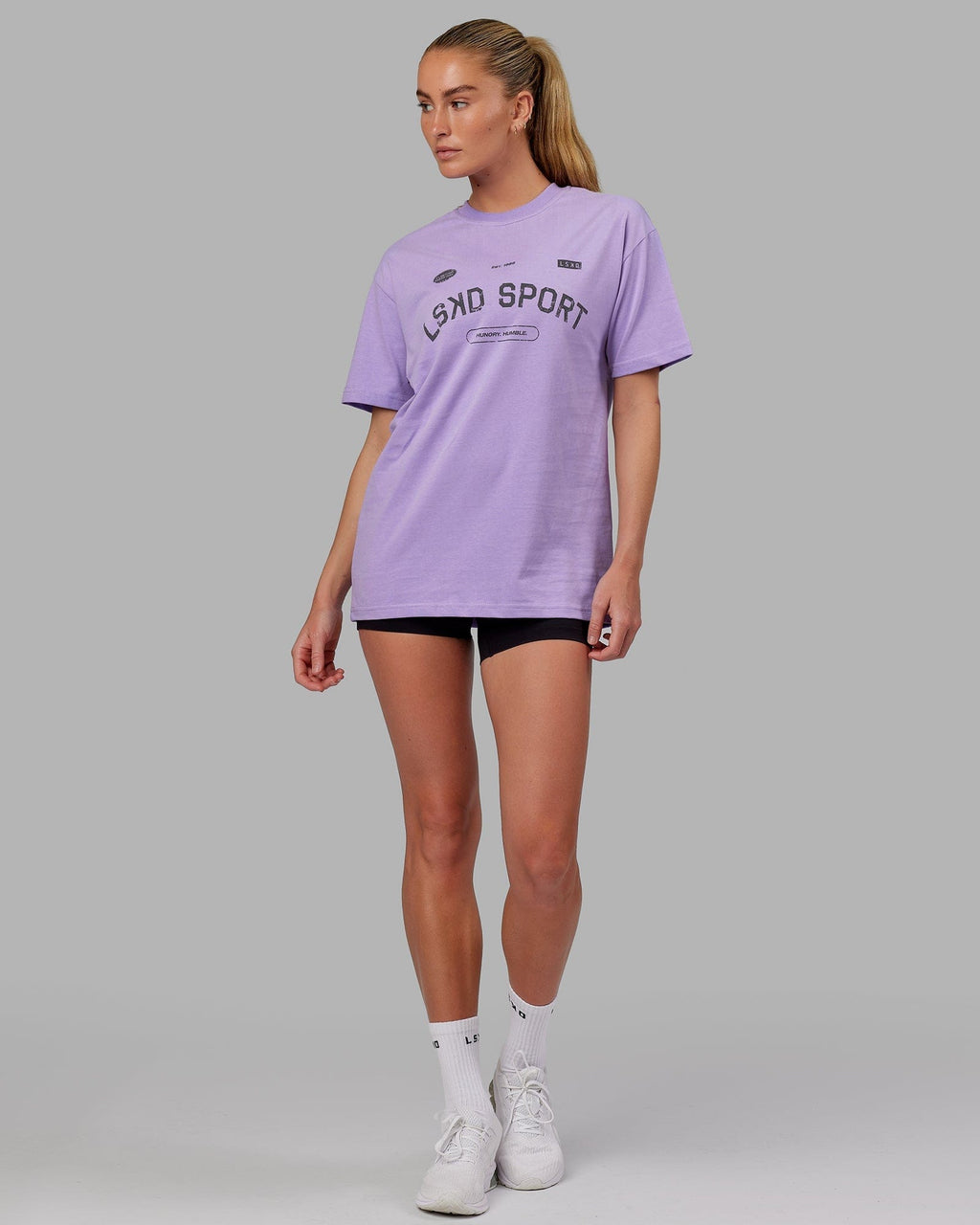 Model wearing Unisex Free Throw Heavyweight Tee Oversize - Peak Purple