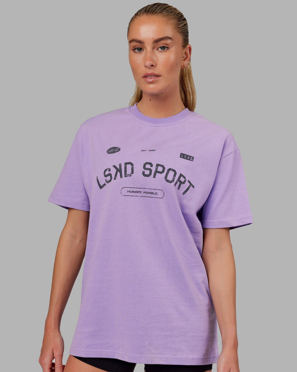Model wearing Unisex Free Throw Heavyweight Tee Oversize - Peak Purple