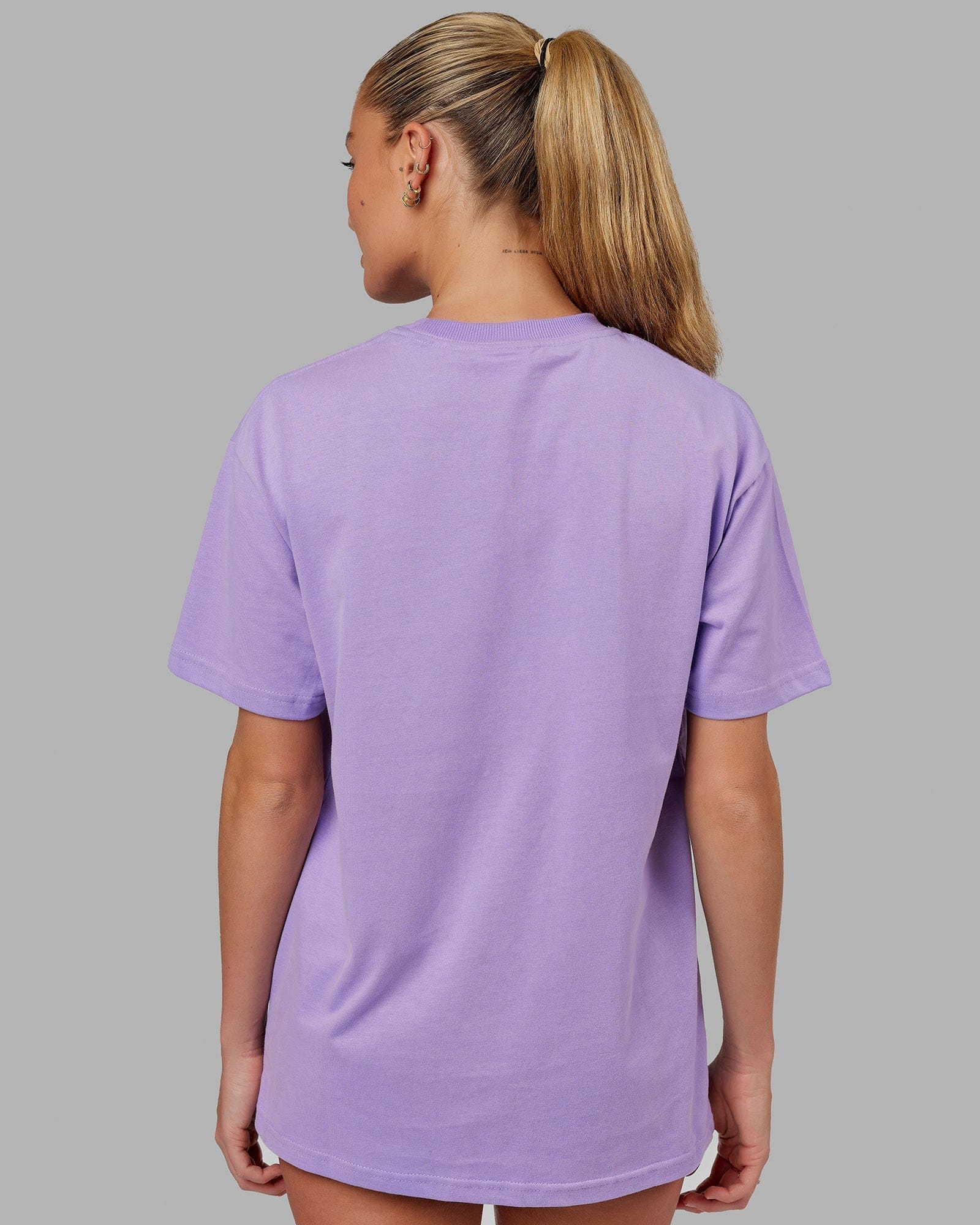 Model wearing Unisex Free Throw Heavyweight Tee Oversize - Peak Purple