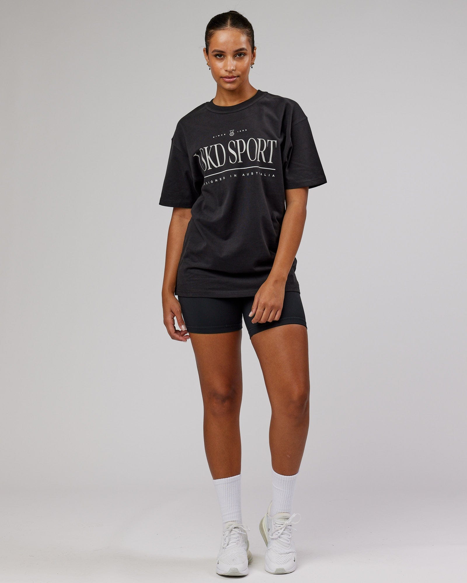 Model wearing Unisex Heritage Heavyweight Tee Oversize - Black-Beige